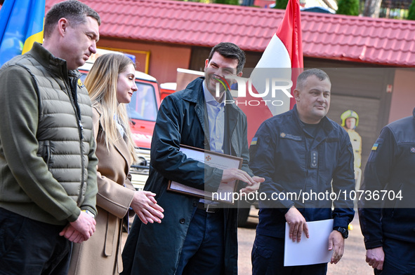 LVIV, UKRAINE - OCTOBER 30, 2023 - Lviv Regional Military Administration head Maksym Kozytskyi, Honorary Vice Consul of Austria in Lviv Khry...