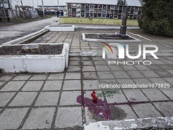 Blood in the location where Yuri Dement, the closest partner of the mayor of Kharkiv, Gennady Kernes, was shot dead near his mother's grave...