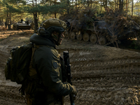 Servicemen of the First Presidential National Guard Brigade of Ukraine BUREVIY (Storm) during a practical exercise at a training ground in n...