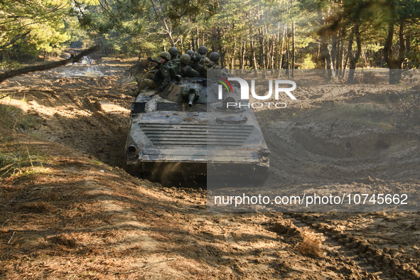 Servicemen of the First Presidential National Guard Brigade of Ukraine BUREVIY (Storm) during a practical exercise at a training ground in n...