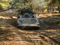 Servicemen of the First Presidential National Guard Brigade of Ukraine BUREVIY (Storm) during a practical exercise at a training ground in n...