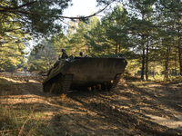 Servicemen of the First Presidential National Guard Brigade of Ukraine BUREVIY (Storm) during a practical exercise at a training ground in n...