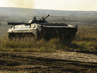 Servicemen of the First Presidential National Guard Brigade of Ukraine BUREVIY (Storm) during a practical exercise at a training ground in n...