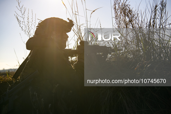 Servicemen of the First Presidential National Guard Brigade of Ukraine BUREVIY (Storm) during a practical exercise at a training ground in n...