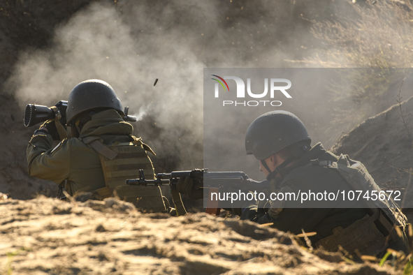 Servicemen of the First Presidential National Guard Brigade of Ukraine BUREVIY (Storm) during a practical exercise at a training ground in n...