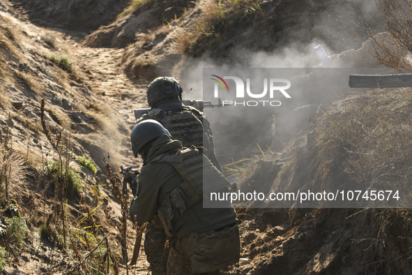 Servicemen of the First Presidential National Guard Brigade of Ukraine BUREVIY (Storm) during a practical exercise at a training ground in n...