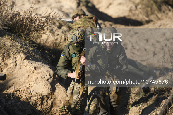 Servicemen of the First Presidential National Guard Brigade of Ukraine BUREVIY (Storm) during a practical exercise at a training ground in n...