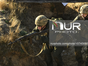 Servicemen of the First Presidential National Guard Brigade of Ukraine BUREVIY (Storm) during a practical exercise at a training ground in n...