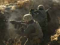 Servicemen of the First Presidential National Guard Brigade of Ukraine BUREVIY (Storm) during a practical exercise at a training ground in n...