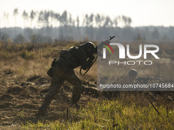 Servicemen of the First Presidential National Guard Brigade of Ukraine BUREVIY (Storm) during a practical exercise at a training ground in n...