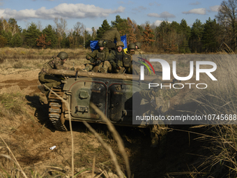 Servicemen of the First Presidential National Guard Brigade of Ukraine BUREVIY (Storm) during a practical exercise at a training ground in n...