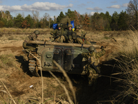 Servicemen of the First Presidential National Guard Brigade of Ukraine BUREVIY (Storm) during a practical exercise at a training ground in n...