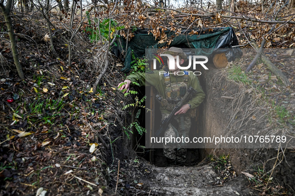 ZAPORIZHZHIA REGION, UKRAINE - NOVEMBER 03, 2023 - A serviceman of the Ukrainian anti-aircraft missile troops walks out of the dugout near R...