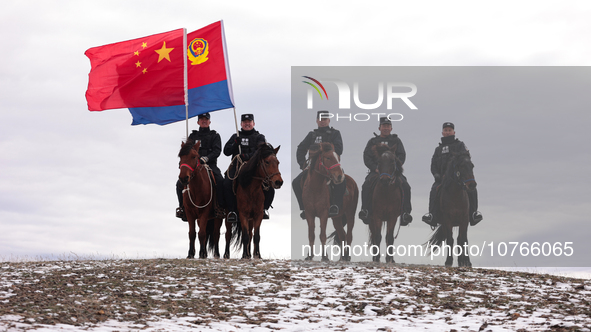 ALTAY, CHINA - NOVEMBER 7, 2023 - Police on horseback carry out a border patrol in Altay, Xinjiang province, China, November 7, 2023. 