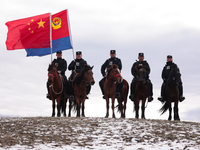 ALTAY, CHINA - NOVEMBER 7, 2023 - Police on horseback carry out a border patrol in Altay, Xinjiang province, China, November 7, 2023. (
