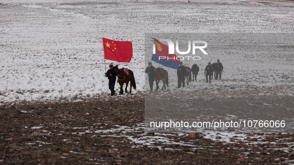 ALTAY, CHINA - NOVEMBER 7, 2023 - Police on horseback carry out a border patrol in Altay, Xinjiang province, China, November 7, 2023. 