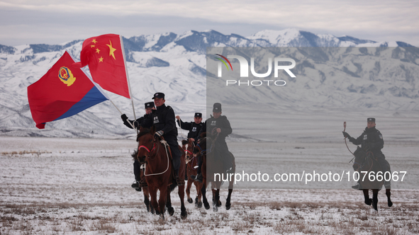 ALTAY, CHINA - NOVEMBER 7, 2023 - Police on horseback carry out a border patrol in Altay, Xinjiang province, China, November 7, 2023. 