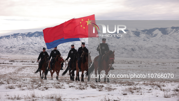 ALTAY, CHINA - NOVEMBER 7, 2023 - Police on horseback carry out a border patrol in Altay, Xinjiang province, China, November 7, 2023. 