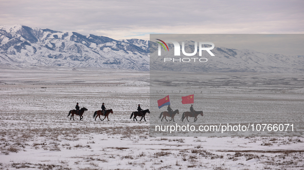 ALTAY, CHINA - NOVEMBER 7, 2023 - Police on horseback carry out a border patrol in Altay, Xinjiang province, China, November 7, 2023. 