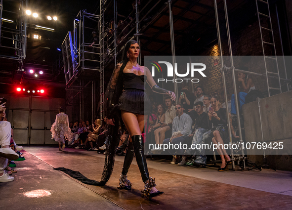 A model wears a creation from the Helo Rocha collection during Sao Paulo Fashion Week, on November 8, 2023. 