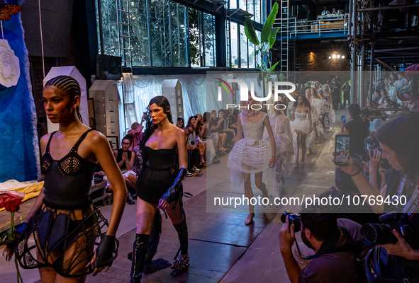 A model wears a creation from the Helo Rocha collection during Sao Paulo Fashion Week, on November 8, 2023. 