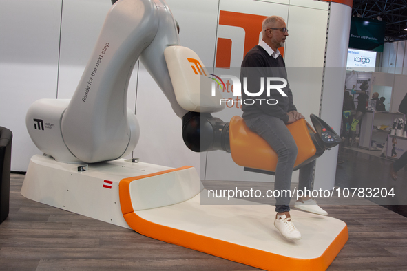 A trade fair attendee is testing the intelligent motion system at the Medica Fair 2023 in Dusseldorf, Germany, on November 13, 2023. 