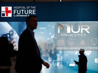 Trade fair attendees are seen at the Medica Fair 2023 in Dusseldorf, Germany, on November 13, 2023. (