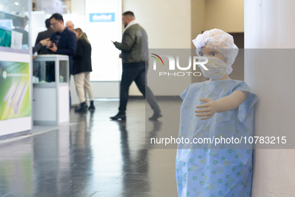 A mannequin wearing a protective mask is being displayed at the Medica Fair 2023 in Dusseldorf, Germany, on November 13, 2023. 