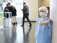 A mannequin wearing a protective mask is being displayed at the Medica Fair 2023 in Dusseldorf, Germany, on November 13, 2023. (