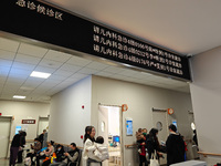 SHANGHAI, CHINA - NOVEMBER 14, 2023 - Parents take their children to see a doctor at the pediatric emergency department of a hospital in Sha...