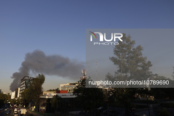 View of fire from Parque Lira in the shoe market in Tepito, Mexico City. 