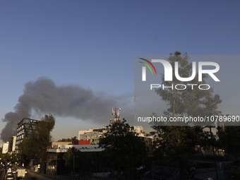 View of fire from Parque Lira in the shoe market in Tepito, Mexico City. (