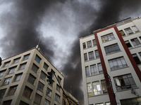 View of fire from the streets of the Historic Center of Mexico City, in the shoe market in Tepito. (