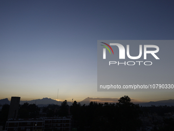 Below, view of the Popocatepetl Volcano from Mexico City emitting smoke at dawn.

Last May, the Government of the State of Mexico, the Gov...