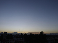 Below, view of the Popocatepetl Volcano from Mexico City emitting smoke at dawn.

Last May, the Government of the State of Mexico, the Gov...