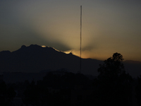 View of the Iztaccihuatl volcano from Mexico City at dawn. (