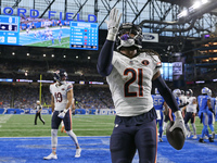 Chicago Bears running back D'Onta Foreman (21) scores a touchdown during the first half of an NFL football game between the Chicago Bears an...