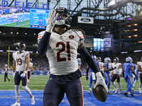 Chicago Bears running back D'Onta Foreman (21) scores a touchdown during the first half of an NFL football game between the Chicago Bears an...