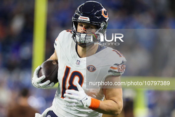 Chicago Bears tight end Robert Tonyan (18) runs the ball ahead of  an NFL  football game between the Detroit Lions and the Chicago Bears in...