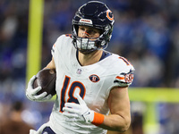 Chicago Bears tight end Robert Tonyan (18) runs the ball ahead of  an NFL  football game between the Detroit Lions and the Chicago Bears in...
