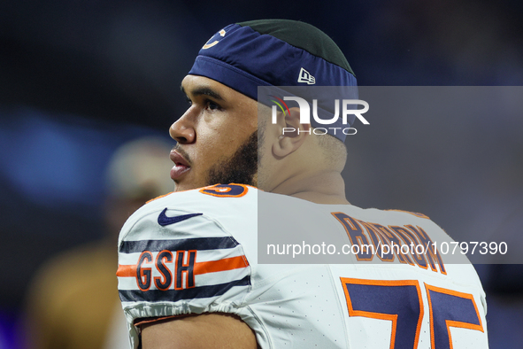 Chicago Bears offensive tackle Larry Borom (75) looks down the field prior to an NFL  football game between the Detroit Lions and the Chicag...