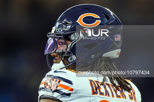 Chicago Bears defensive tackle Gervon Dexter Sr. (99) looks down the field ahead of an NFL  football game between the Detroit Lions and the...