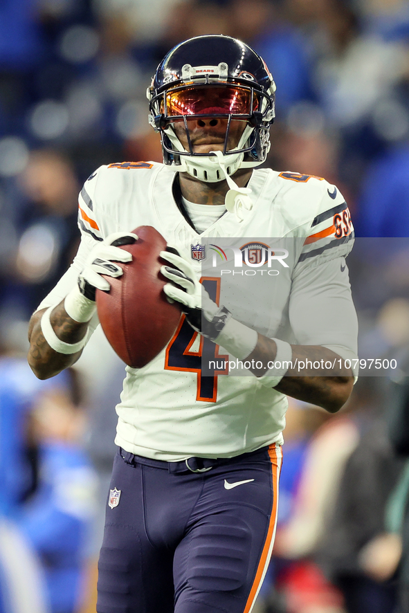 Chicago Bears safety Eddie Jackson (4) looks to throw ball down the field ahead of an NFL  football game between the Detroit Lions and the C...