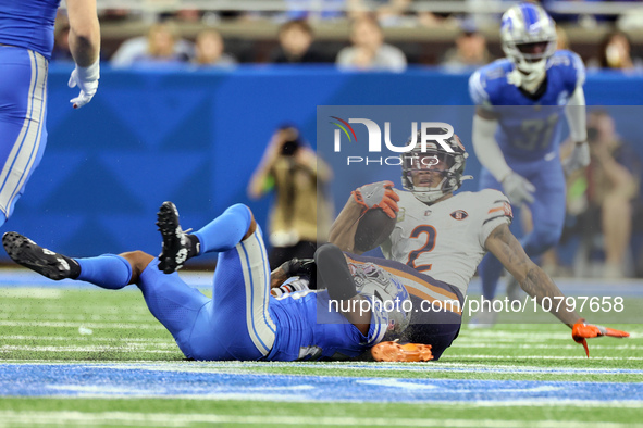 Chicago Bears wide receiver DJ Moore (2) is tackled by Detroit Lions cornerback Jerry Jacobs (23) during  an NFL  football game between the...