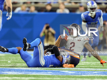 Chicago Bears wide receiver DJ Moore (2) is tackled by Detroit Lions cornerback Jerry Jacobs (23) during  an NFL  football game between the...