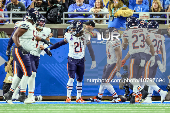 Chicago Bears running back D'Onta Foreman (21) is congratulated by teammates after making a touchdown during  an NFL  football game between...