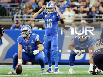 Detroit Lions quarterback Jared Goff (16) calls a play as Detroit Lions center Frank Ragnow (77) prepares to snap the ball during  an NFL  f...