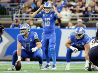 Detroit Lions quarterback Jared Goff (16) calls a play as Detroit Lions center Frank Ragnow (77) prepares to snap the ball during  an NFL  f...