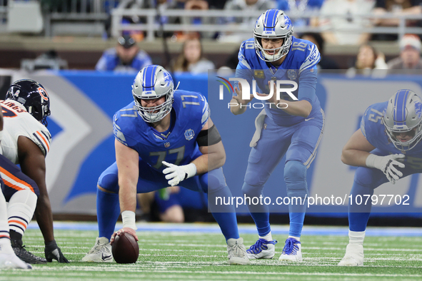 Detroit Lions quarterback Jared Goff (16) prepares to catch a snap from Detroit Lions center Frank Ragnow (77) during  an NFL  football game...