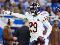 Chicago Bears cornerback Tyrique Stevenson (29) gestures after intercepting the ball during  an NFL  football game between the Detroit Lions...